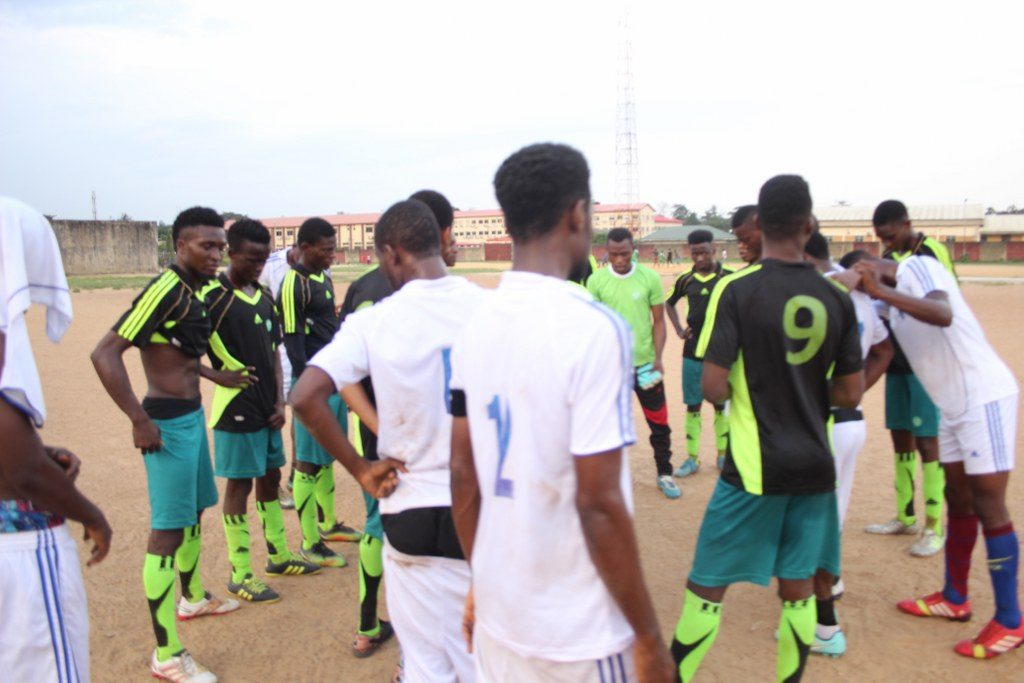 TurfSeason and Cares FC Players praying together after the Matchday17 Game - September 2, 2018